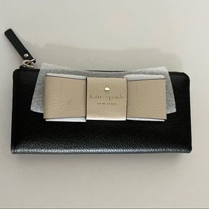 Kate Spade Mathews Street Nisha wallet in black/cement, never used